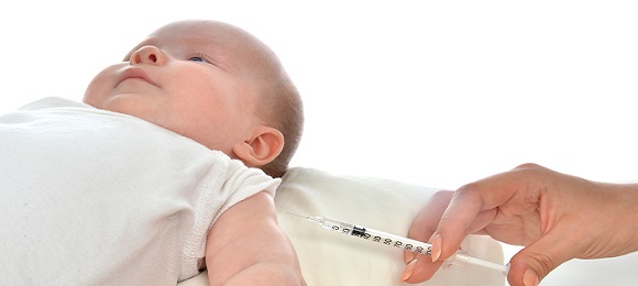 Doctor vaccinating child baby flu injection shot